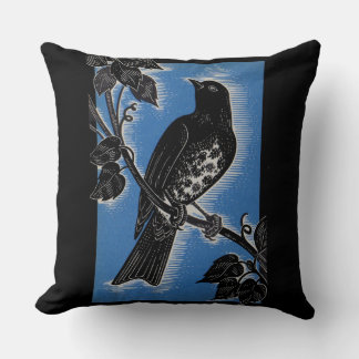 black thrush with blue throw pillow