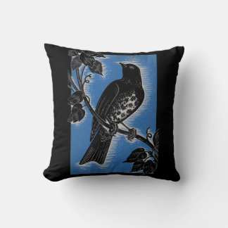 black thrush with blue throw pillow