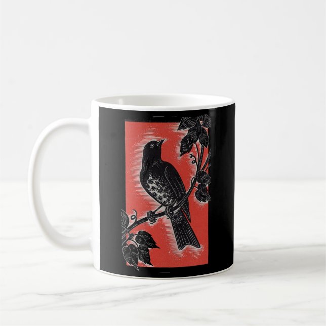 black thrush with red coffee mug (Left)