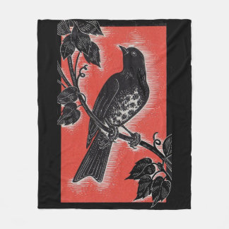 black thrush with red fleece blanket
