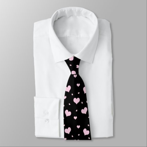 Black tie with a light pink heart pattern