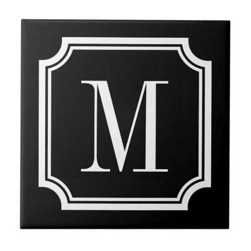 Black tile with elegant border and monogram letter