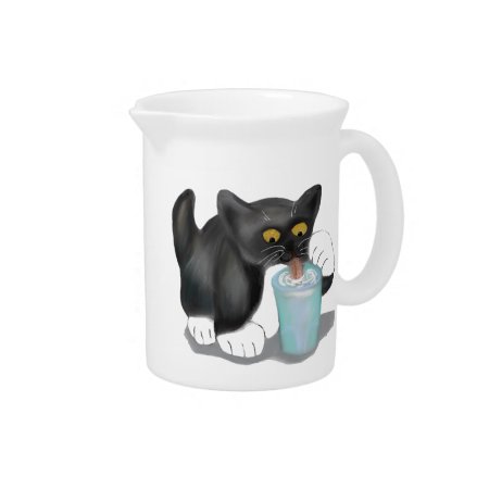 Black Tuxedo Kitten Sneaks A Glass Of Milk Pitcher