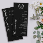 Black Typography Laurel Wreath Monogram Wedding<br><div class="desc">Elegant black 9x4 wedding program in a black and white typography design with a laurel wreath monogram and beautiful fonts. Black typography wedding program with a greenery monogram and beautiful fonts. Flat wedding program with an elegant monogram and beautiful fonts and greenery details in white against a black background.</div>