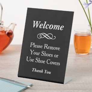 Black Welcome Remove Shoes Covers Pedestal Sign