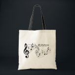 Black & White Custom Text Music Teacher/Student Tote Bag<br><div class="desc">This personalized music-themed tote bag is the perfect blend of practical and thoughtful for any music lover, teacher, or performer. Featuring a bold black treble clef and flowing musical notes across the front, the design is both expressive and stylish. The customizable text section lets the customer add their own name,...</div>