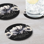 Black White Elegant Floral Wedding Round Paper Coaster<br><div class="desc">Cute and simple black and white flower wedding design. A classic but whimsical look with black, gray and cream colored flowers with black fonts and modern lettering. Edit all of the text to your own information. Great for a boho wedding with a modern twist, a winter or spring classic affair,...</div>