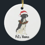 Black & White German Shorthaired Pointer Christmas Ceramic Ornament<br><div class="desc">Make the nice list this year with a personalized Christmas ornament of your sweet black and white german shorthaired pointer elf in a santa hat and red and green holly wreath! For the sweetest gifts,  pair it with a matching art print or another item from my collection!</div>