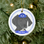 Black & White German Shorthaired Pointer Hanukkah Ceramic Ornament<br><div class="desc">Celebrate your favorite mensch on a bench with personalized ornament! This design features a sweet illustration of a black and white german shorthaired pointer dog with a blue and white yarmulke. For the most thoughtful gifts, pair it with another item from my collection! To see more work and learn about...</div>