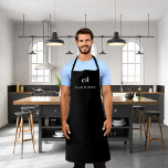 Black white monogram name business apron<br><div class="desc">A stylish black background. Personalize and add your monogram initials and name. Modern block letters.</div>