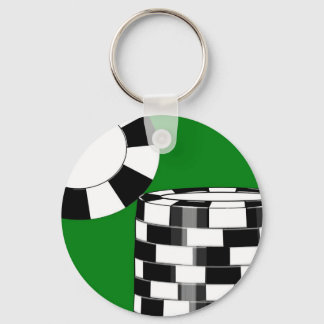 Black white poker chips on green keychain
