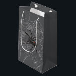 Black Widow Spider And Spiderweb Drawing Art Small Gift Bag<br><div class="desc">Gift Giving Bag printed with Black Widow Spider And Spiderweb Drawing Art original hand drawn graphic design artwork illustration by TheFabricSeal print on demand shop at Zazzle.com #ZazzleMade ©️Original. https://www.zazzle.com/store/thefabricseal Celebrate Halloween and Goth any time of the year with our cool looking black colored with red marking widow species spider...</div>
