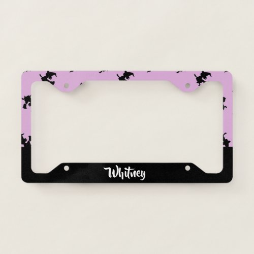 Black witches silhouette on purple license plate frame