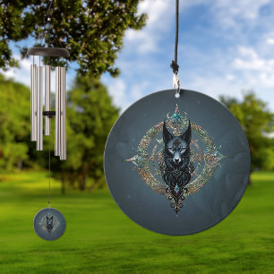 Black wolfs head with piercing blue eyes,  wind chime 
