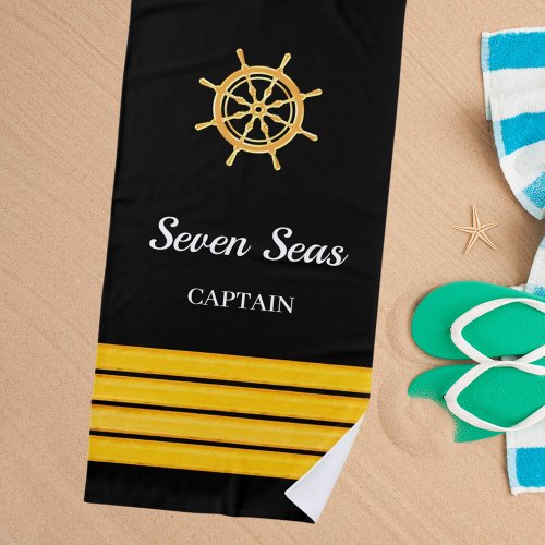 Black yacht boat name gold steering wheel stripes beach towel