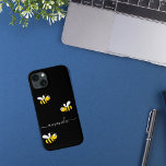 Black yellow bees summer name iPhone 13 case<br><div class="desc">Decorated with happy, smiling yellow and black bumblebees. A chic black background. Personalize and add your name. The name is written with a modern hand lettered style script. White colored letters. To keep the swashes only delete the sample name, leave the spaces or emoji's in front and after the name...</div>
