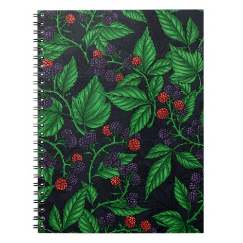 Blackberries on dark gray notebook