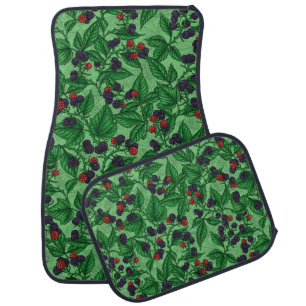 Blackberries on green car floor mat