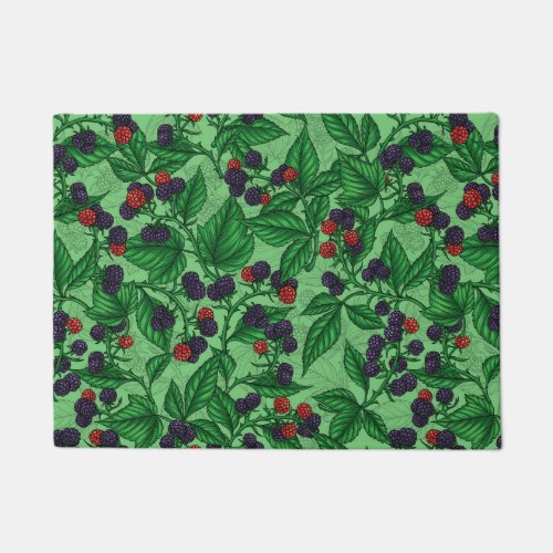 Blackberries on green doormat