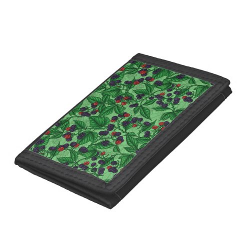 Blackberries on green trifold wallet