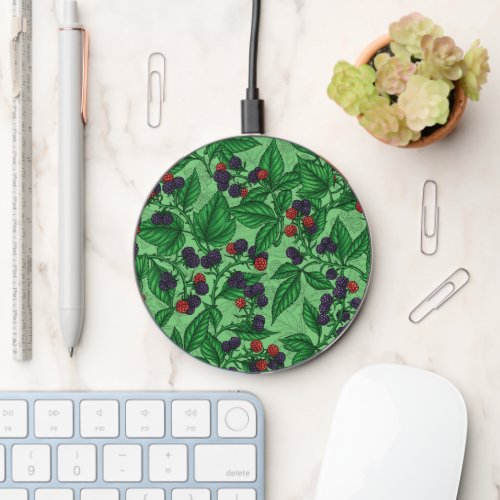 Blackberries on green wireless charger 