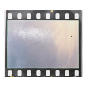 Blank 35mm film frame or strip on white background duvet cover