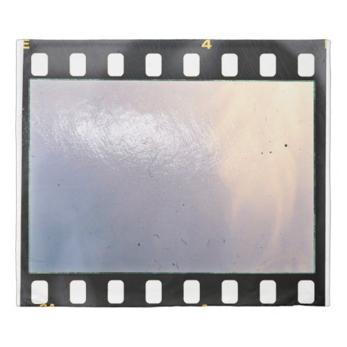 Blank 35mm film frame or strip on white background duvet cover