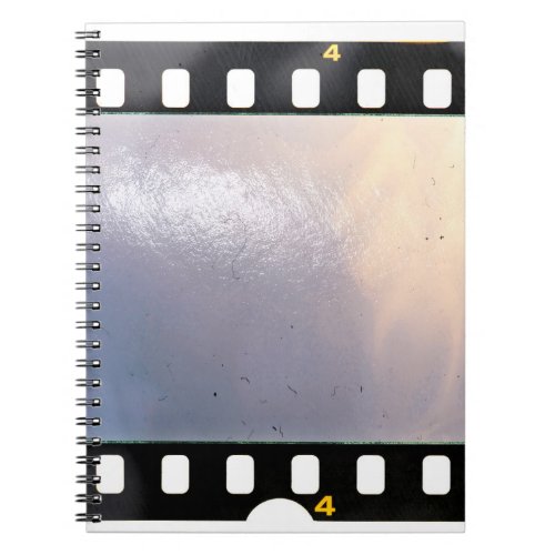 Blank 35mm film frame or strip on white background notebook