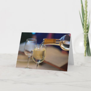 Blank greeting card with wine pouring photo