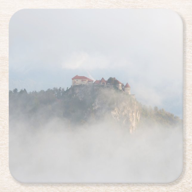 Bled castle surrounded by clouds square paper coaster (Front)