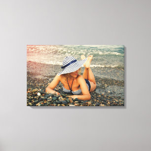 Blond woman at the beach canvas print