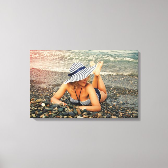 Blond woman at the beach canvas print (Front)