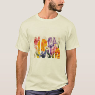 "BLOOM" is an arrangement of mixed flowers against T-Shirt