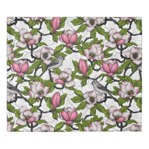 Blooming magnolia and titmouse bird duvet cover