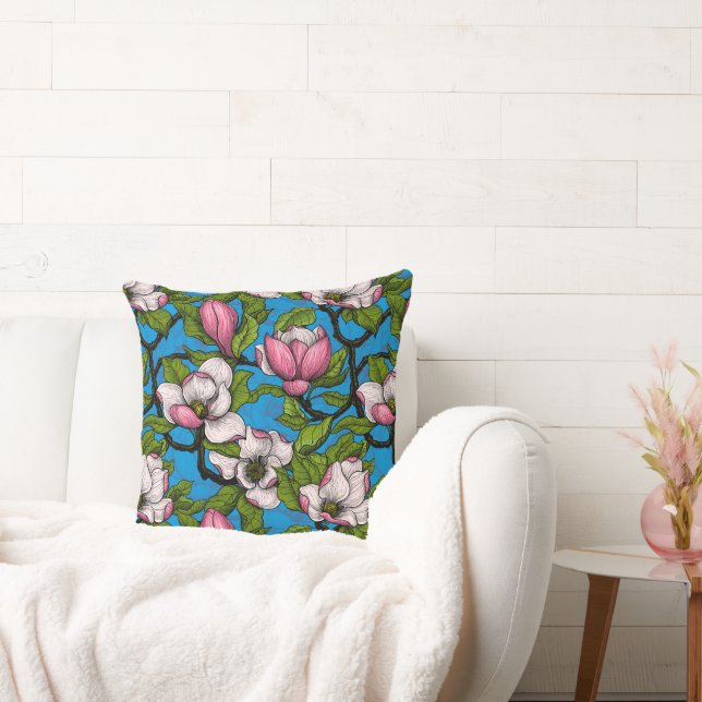 Blooming magnolia on blue throw pillow (Couch)