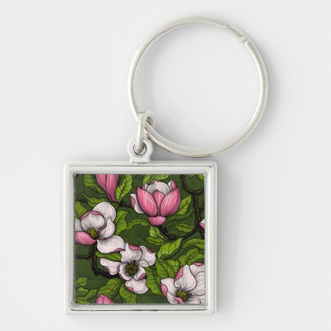 Blooming magnolia on dark green keychain (Front)