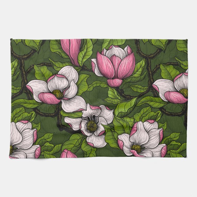 Blooming magnolia on dark green kitchen towel (Horizontal)