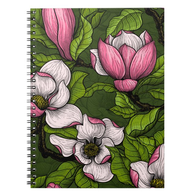 Blooming magnolia on dark green notebook (Front)