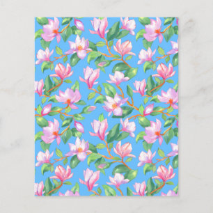 Blooming magnolia on sky blue