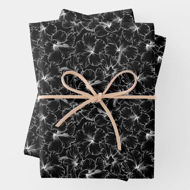 Blooming White Hibiscus Flowers on Black Wrapping Paper Sheets (In situ)