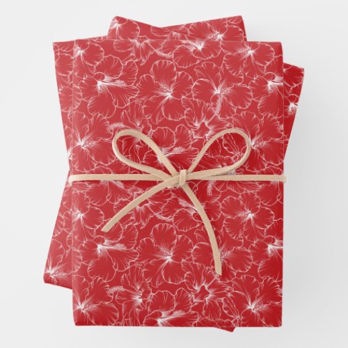 Blooming White Hibiscus Flowers on Red Wrapping Paper Sheets