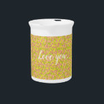 Blossom Haze Beverage Pitcher<br><div class="desc">A dreamy, abstract print that blurs the lines between floral forms and soft, atmospheric textures. Using a gentle interplay of sunny butter yellow, muted pear green, and tender peach pink, the pattern creates an illusion of flowers softly emerging from a hazy, painterly mist, offering a subtle yet captivating visual depth....</div>