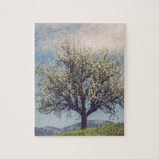 Blossom tree on a hill in Switzerland Jigsaw Puzzle