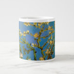 Blossoming Almond Tree by Vincent van Gogh Large Coffee Mug<br><div class="desc">Blossoming Almond Tree by Vincent van Gogh is a vintage fine art post impressionism still life floral painting featuring blooming flowers on the branches of an almond tree in a garden. The blue sky is in the background. About the artist: Vincent Willem van Gogh (1853 -1890) was one of the...</div>