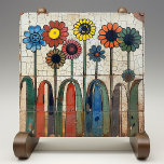 Blossoming Array Crackle Glaze Ceramic Tile<br><div class="desc">Welcome to a garden of eternal spring with this enchanting ceramic tile, where whimsical flowers bloom in a vibrant dance of colors. The crackled glaze background sets the stage for a delightful variety of flowers, each petal and leaf painted with meticulous care. From the deep indigo and sage greens to...</div>