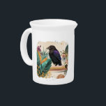 BlossomRaven in the jungle Beverage Pitcher<br><div class="desc">The picture shows a majestic raven with shiny black fiddle that captures purple and blue accents, sitting on a branch of lush tropical plants. Surrounded by bright green leaves, colorful flowers and a warm color gradient, it exudes mystical peace and wild beauty. The harmonious colors and the detailed nature give...</div>