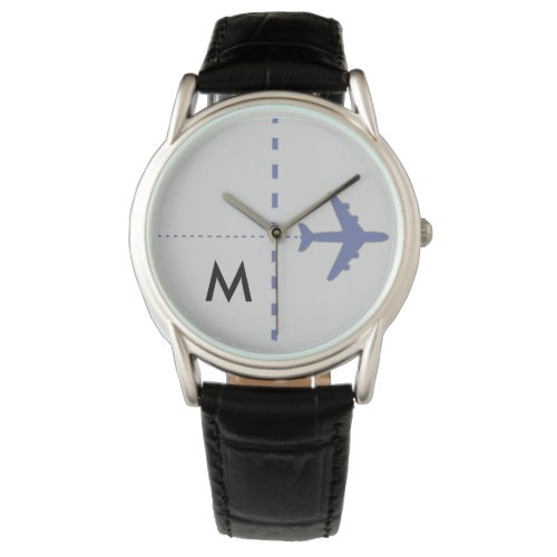 blue aeroplane with initial watch