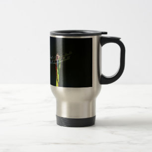 Blue and black Dragonfly on green and red grass Travel Mug