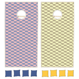 Blue and brown floral prints on pink and yellow cornhole set