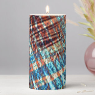 Blue and brown strokes rustically crossed in silky pillar candle